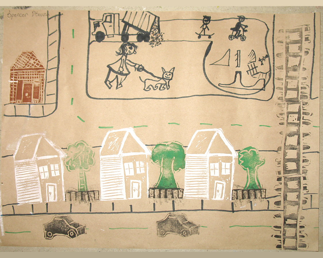 Primary age students created several lino-block stamps.  They used their stamps, magic markers and the stamps of others, to create pictures of imagined cities.    